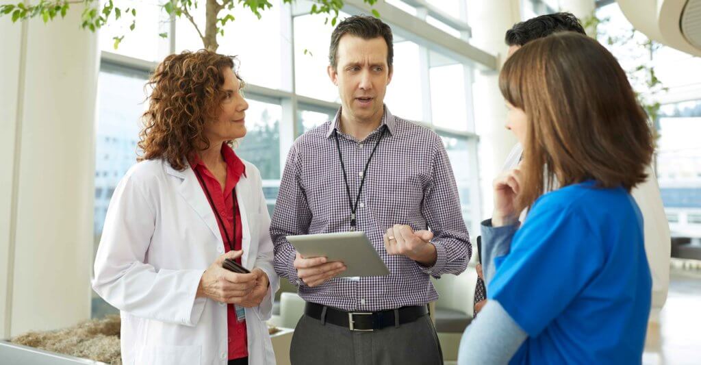 Clinicians discuss adjunctive modalities to treat a wound.