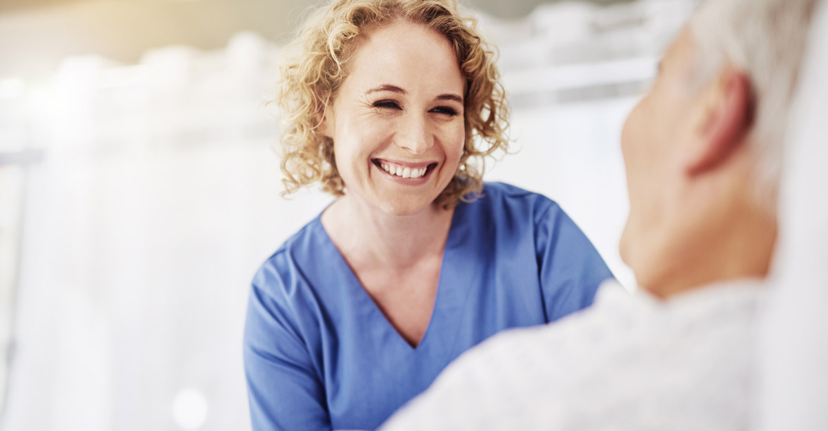 nurse smiles at patient